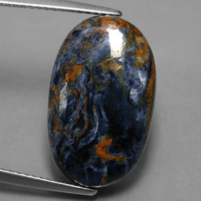 Pietersita multicolor natural de 10,89 ct, corte óvalo, opaco