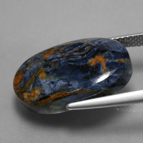 Pietersita multicolor natural de 10,89 ct, corte óvalo, opaco