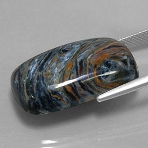 Pietersita multicolor natural de 22,09 ct, baguette, opaco