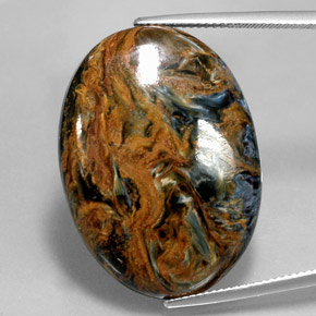 Pietersita multicolor natural de 31,58 ct, corte óvalo, opaco