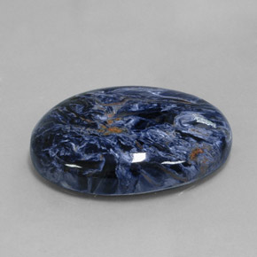 Pietersita multicolor natural de 31,93 ct, corte óvalo, opaco