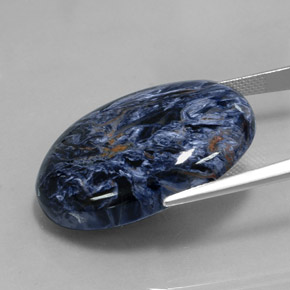 Pietersita multicolor natural de 31,93 ct, corte óvalo, opaco