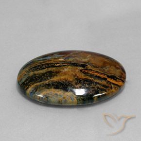 Pietersita Multicolor natural de 23.92 ct, Ovalada, Opaco