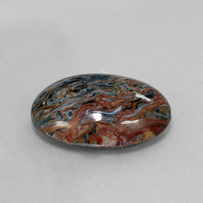 Pietersita multicolor natural de 6,85 ct, corte óvalo, opaco