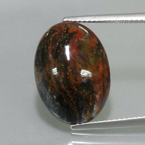 Pietersita multicolor natural de 7,68 ct, corte óvalo, opaco