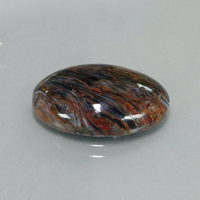 Pietersita multicolor natural de 7,82 ct, corte óvalo, opaco