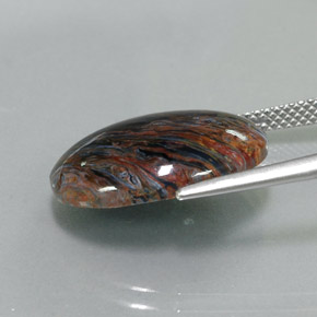 Pietersita multicolor natural de 7,82 ct, corte óvalo, opaco