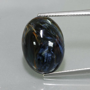 Pietersita multicolor natural de 9,68 ct, corte óvalo, opaco