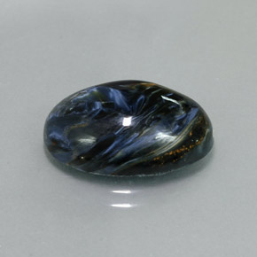 Pietersita multicolor natural de 9,68 ct, corte óvalo, opaco