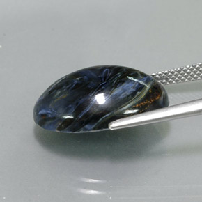 Pietersita multicolor natural de 9,68 ct, corte óvalo, opaco