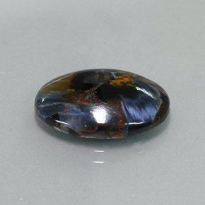 Pietersita multicolor natural de 7,40 ct, corte óvalo, opaco