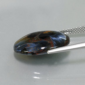 Pietersita multicolor natural de 7,40 ct, corte óvalo, opaco