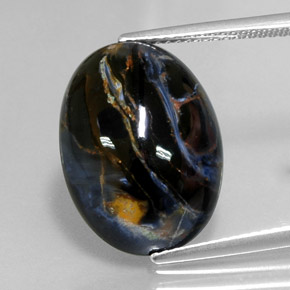 Pietersita multicolor natural de 10,98 ct, corte óvalo, opaco