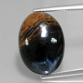 Pietersita multicolor natural de 12,64 ct, corte óvalo, opaco