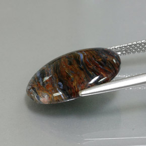 Pietersita multicolor natural de 6,80 ct, corte óvalo, opaco