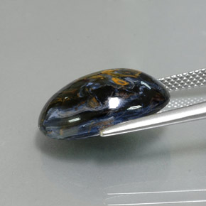 Pietersita multicolor natural de 9,96 ct, corte óvalo, opaco