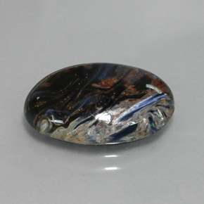 Pietersita multicolor natural de 7,94 ct, corte óvalo, opaco