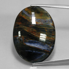 Pietersita multicolor natural de 27,17 ct, corte óvalo, opaco