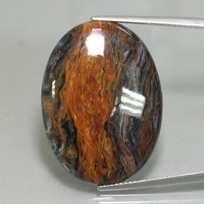 Pietersita multicolor natural de 21,00 ct, corte óvalo, opaco