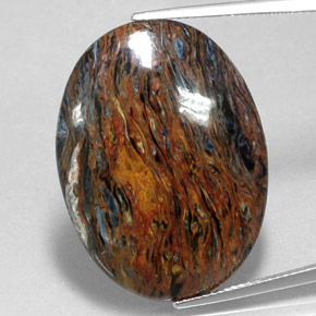 Pietersita multicolor natural de 22,70 ct, corte óvalo, opaco