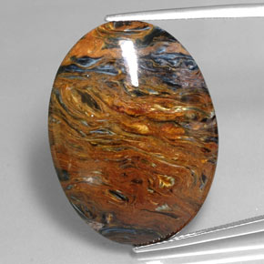 Pietersita multicolor natural de 25,47 ct, corte óvalo, opaco
