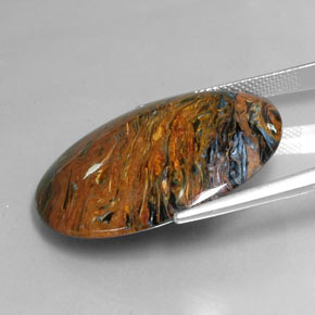 Pietersita multicolor natural de 25,47 ct, corte óvalo, opaco