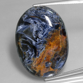 Pietersita multicolor natural de 37,83 ct, corte óvalo, opaco