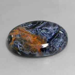 Pietersita multicolor natural de 37,83 ct, corte óvalo, opaco