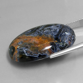 Pietersita multicolor natural de 37,83 ct, corte óvalo, opaco