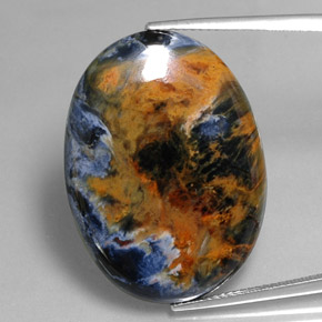 Pietersita multicolor natural de 26,63 ct, corte óvalo, opaco