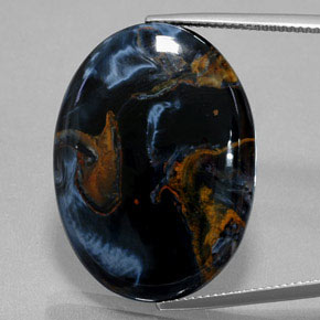 Pietersita multicolor natural de 27,99 ct, corte óvalo, opaco