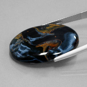 Pietersita multicolor natural de 27,99 ct, corte óvalo, opaco