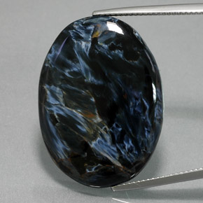 Pietersita multicolor natural de 26,70 ct, corte óvalo, opaco