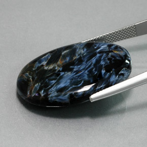 Pietersita multicolor natural de 26,70 ct, corte óvalo, opaco