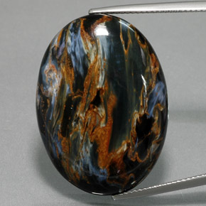 Pietersita azul natural de 32,61 ct, corte óvalo, opaco