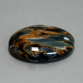 Pietersita azul natural de 32,61 ct, corte óvalo, opaco