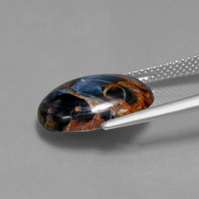 Pietersita multicolor natural de 5,42 ct, corte óvalo, opaco