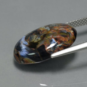 Pietersita multicolor natural de 8,29 ct, corte óvalo, opaco