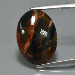 Pietersita multicolor natural de 6,70 ct, corte óvalo, opaco