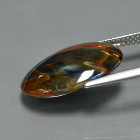 Pietersita multicolor natural de 6,70 ct, corte óvalo, opaco