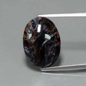 Pietersita multicolor natural de 7,09 ct, corte óvalo, opaco