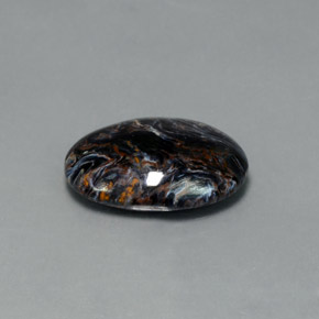 Pietersita multicolor natural de 7,09 ct, corte óvalo, opaco