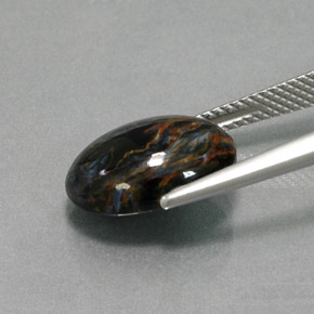 Pietersita multicolor natural de 5,20 ct, corte óvalo, opaco