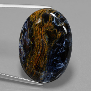 Pietersita multicolor natural de 28,85 ct, corte óvalo, opaco