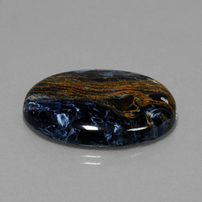 Pietersita multicolor natural de 28,85 ct, corte óvalo, opaco