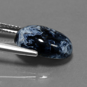 Pietersita multicolor natural de 4,85 ct, corte óvalo, opaco