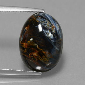 Pietersita multicolor natural de 6,33 ct, corte óvalo, opaco