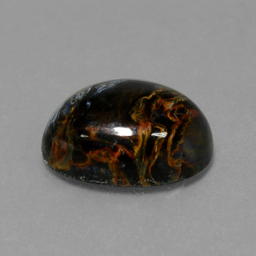 Pietersita multicolor natural de 6,33 ct, corte óvalo, opaco