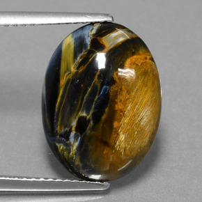 Pietersita multicolor natural de 6,41 ct, corte óvalo, opaco