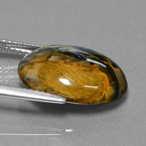 Pietersita multicolor natural de 6,41 ct, corte óvalo, opaco